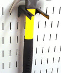Slotted Tool Board Workstation Accessory Kit For Pegboard Black Secure Hook Engagement holding a hammer on pegboard