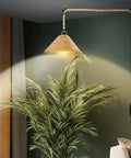 Boho Plug In Pendant Light With Dimmable Bulb And Switch, Hand Woven Hemp Rope Farmhouse Pendant Fixture, 15 Foot Cord, lit over a plant