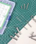 Premium 304 Stainless Steel Clevis Pin And Cotter Pin Kit Heavy Duty 122 Pieces with box and pins on green grid surface