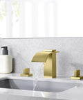 Brushed Gold Waterfall Bathroom Faucet, 8-Inch Widespread 3-Hole Sink Faucet, Solid Brass Valve installed on modern vanity
