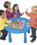 Kids playing Candy Land Kingdom Of Sweet Adventures Board Game For Kids Ages 3 Plus A Dope Beginner Classic at a blue table.