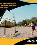 Person using Indoor And Outdoor Volleyball Training Net System Built To Last Sturdy Adjustable And Portable on beach