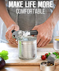 Person using Heavy Duty Manual Can Opener With Smooth Cutting Edge on a tin can, ergonomic non-slip handle, in a kitchen setting.