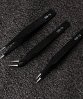 Three black stainless steel tweezers from 6 Piece ESD Anti Static Tweezers Set for electronics repair, labeled ESD-14, ESD-15, ESD-16.