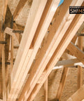 Wooden planks forming roof structure with 'Nelson Wood Shims' label visible.