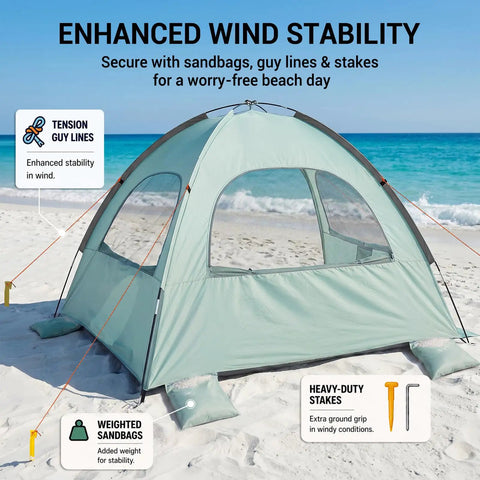 Mint Green Beach Tent With Anti UV Sun Shade Portable 3 Person Shelter Extendable Floor 3 Ventilating Mesh Windows Carrying Bag Stakes And Guy Lines UPF 50 Protection For Sunny Day Fun demonstrating wind stability on beach.