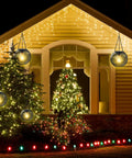 Auto On Solar Lanterns For Outdoors Upgraded Hanging Garden Lights illuminating a house and garden at night, warm festive ambiance.