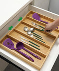 Expandable Bamboo Drawer Organizer For Kitchen Utensils And Flatware Adjustable Cutlery Tray And Knife Organizer Drawer Divider With Five Slots Fits Large Or Small Drawers Go To Kitchen Must Have Home Organizer in drawer with utensils placed.