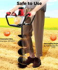 Person using Workhorse 1.5KW Electric Post Hole Digger With 6 Inch Drill Bit And 11.8 Inch Extension Rod in a field.