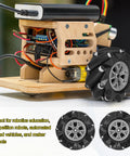 Two 97mm mecanum wheels with ABS rubber, black tires and gray centers beside a wooden robot chassis