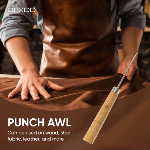 Solid Wooden Scratching Awl For Leatherwork And Bookbinding With Comfort Grip Hella Durable Total Game Changer For Precision Marking Fast Stitch Removal And Everyday Embroidery Projects Built Tough To Last, held by craftsman on brown fabric.