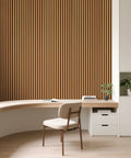 Roll Flexible Acoustic Wood Slat Wall Panels Teak Finish sound-absorbing wall decor in modern office setting with desk.