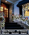 Outdoor view of Dope Christmas Globe Curtain Lights 11.5Ft 96LED Crystal Ball Fairy Lights decorating a house entrance.