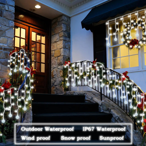 Outdoor view of Dope Christmas Globe Curtain Lights 11.5Ft 96LED Crystal Ball Fairy Lights decorating a house entrance.