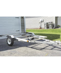 Aluminum 5x8 Utility Trailer Kit With Rustproof Frame 1715 Lb Payload And 1980 Lb GVWR attached to a car in driveway