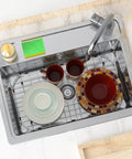 Top view of 26 Inch By 14 Inch Kitchen Sink Grid Protectors Set Heavy Duty Stainless Steel Bottom Grid with dishes on it