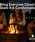 People gathered around Cauldron Wood Burning Outdoor Fire Pit For Patio And Backyard Hangouts, flames visible through spark screen.