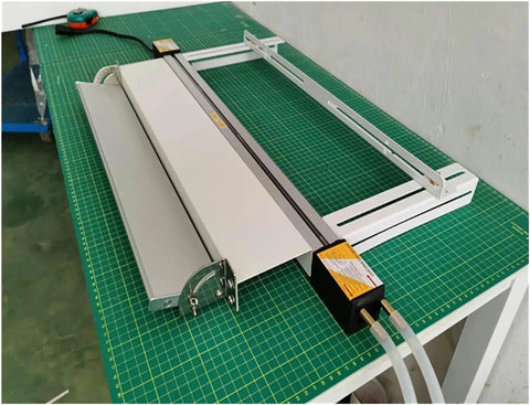 Hassle Free 125 Cm Acrylic Bender Heater Press For Curving Plastic Sheets Easily With Variable Temp Controls, water cooled rails on green cutting mat.