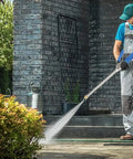 Man using Jet Nozzle Pressure Washer Hose Attachment Be a Cleaning Beast With This Power Wand For Garden Gutter Window And Car Cleaning Blue