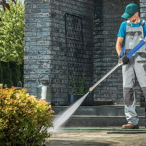 Man using Jet Nozzle Pressure Washer Hose Attachment Be a Cleaning Beast With This Power Wand For Garden Gutter Window And Car Cleaning Blue