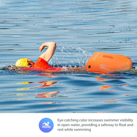 Swimmer with 35L Swim Buoy Dry Bag Floating Backpack in bright orange in open water, enhancing visibility and safety.