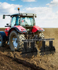 Red tractor using 32 Inch Heavy Duty Tow Behind Disc Harrow Plow With Universal 2 Inch Hitch Adjustable Height For ATV