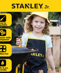 Six Piece Kid Friendly Wheelbarrow And Garden Tool Set With Apron And Gloves For Backyard Play, child holding spade
