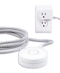 Braided Extension Cord With On Off Switch, 6 Ft Power Cable With 3 Prong Plug, Slip Resistant Base, Tabletop Or Wall Mountable, Tangle Free And Plug And Play Ready For Lamps And Holiday Lights, White And Gray 41095 connected to a wall outlet.