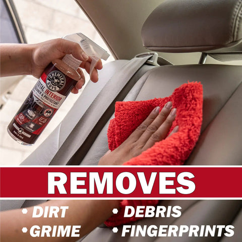 Hand wiping leather car seat with cleaner spray, All In One Interior Cleaner And Protectant With Black Cherry Scent, 16 Oz