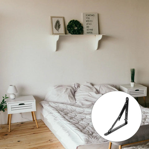 Heavy Duty Folding Black Iron Wall Brackets with solid support for tough durable shelves in a bedroom.
