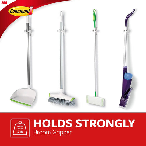 Smooth Broom And Mop Gripper Organizer With Adhesive Strips For Damage Free Hanging Holds Up To Four Pounds For Handles Ranging From Point Eight To One Inch Handy Home Cleanup Solution holding cleaning tools.