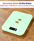 Reliable 5000 G Digital Kitchen Scale With 1 G Precision, Tare Function, And Multi Unit Readouts Including Oz, Lb Oz, Fl Oz, G, And Ml, Big Easy To Read Display For Quick Everyday Cooking Prep on mint scale showing 3 g and almonds