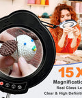 15X Lighted Magnifying Glass With Clamp Desk Lamp LED Magnifier used in crafting, highlighting knitted toy details