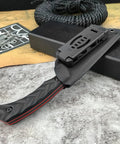 Fixed Blade Knife With D2 Steel Blade, Textured G10 Handle, And Kydex Sheath For Safe Carry shown in sheath on grey background.