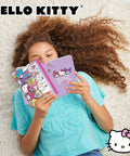 Child reading notebook from Hello Kitty And Friends 22-Piece Stationery Set With Totally Cute Kawaii Notebooks, Stickers, and Accessories.