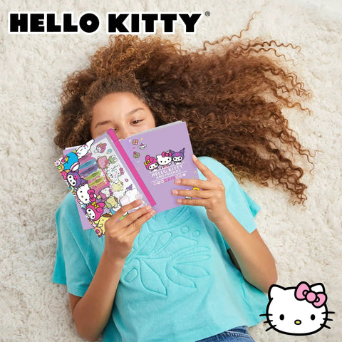 Child reading notebook from Hello Kitty And Friends 22-Piece Stationery Set With Totally Cute Kawaii Notebooks, Stickers, and Accessories.