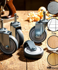 Heavy Duty Four Inch Swivel Caster Wheels With Non Marking Rubber Tires And 7/16 Inch Threaded Stems on wooden surface.