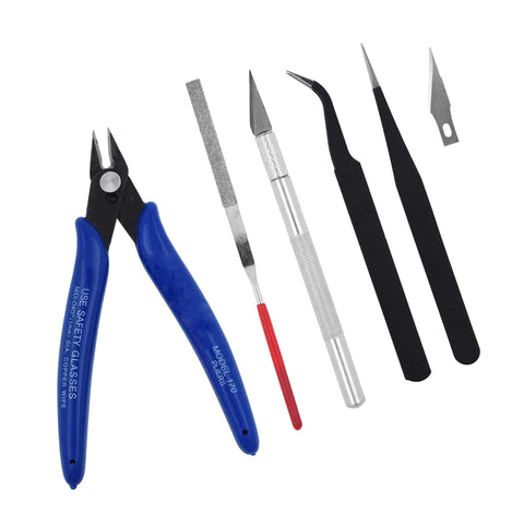 Front view: 7-piece plastic model tool set with blue nippers, file, knife, curved and straight tweezers, spare blade.