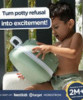 A child holding a green pastel Leak Proof Portable Toddler Toilet Seat For Potty Training, designed for travel with a cushioned grip.