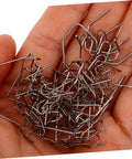 Hand holding silver staples from 600Pcs Car Repair Welding Staples Kit Assorted For Bumper Repair Easy To Use Welding Staples For Quick Crack Fix Enhanced Efficiency For Auto Repair Professionals.
