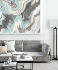 58 Inch Floor Lamp In Matte Black Finish With White Linen Rectangular Shade beside gray sofa in living room.