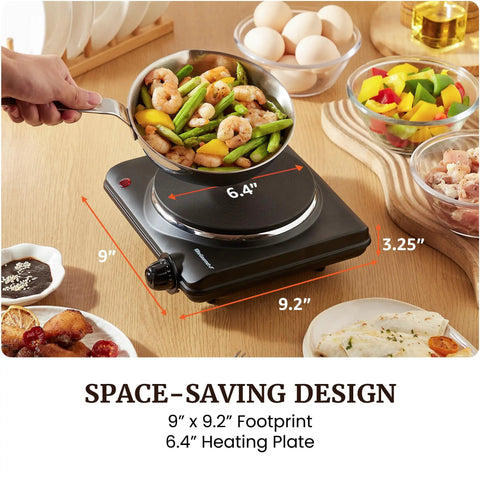 Roadready Electric Hot Plate Featuring Slick Cast Iron Cooking Surface Seven Speed Heat Dials Compact 1000 Watt Portable Burner on a countertop.