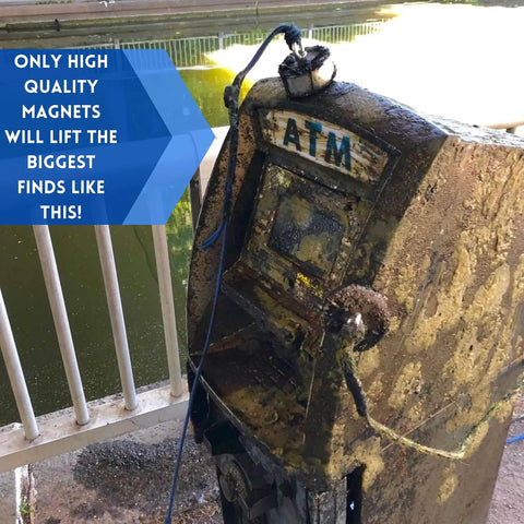 Beefy 1325 Lbs Large Magnet Fishing Kit With Double Sided Neodymium N52 Magnets lifting an old ATM from muddy water