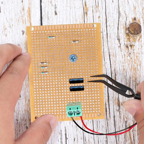 10 Pack 70mm x 90mm PCB Board Prototype Kit Universal Printed Circuit Board Copper Stripboard Perfboard For Electronics Experiments And DIY Soldering Projects Perfect For Makers And DIYers with components and hands holding tweezers.
