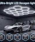 Hexagon LED Garage Lights 210W 25200LM 35 Pack Ultra Bright Ceiling Panels For Garage Workshop Gym Car Detailing Barber Auto Shops 6500K Daylight CRI Over 85 True Color Illumination installed in a garage lighting a car workshop area.