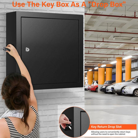 Wall-mounted 100 Key Cabinet Lock Box With Anti Theft Function And Key Tags installed in a garage, showing key return drop slot.