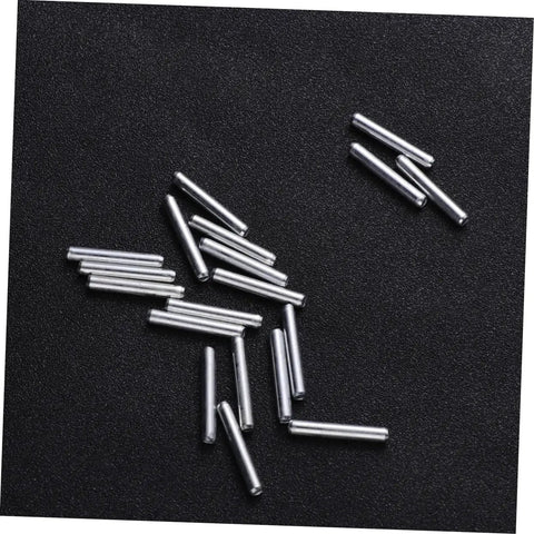 Silver metal pieces from 120pcs Robot Drive Shaft Kit For DIY Projects, Transmission Shafts And RC Car Axle Gears, on black background