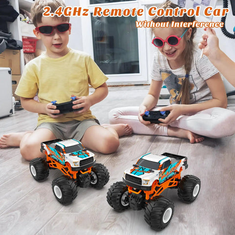 Two kids play indoors with One Sixteen Scale RC Monster Truck For All Terrain 2.4GHz Dope Off Road Vehicle With Up To 20 Km Per Hour Speed