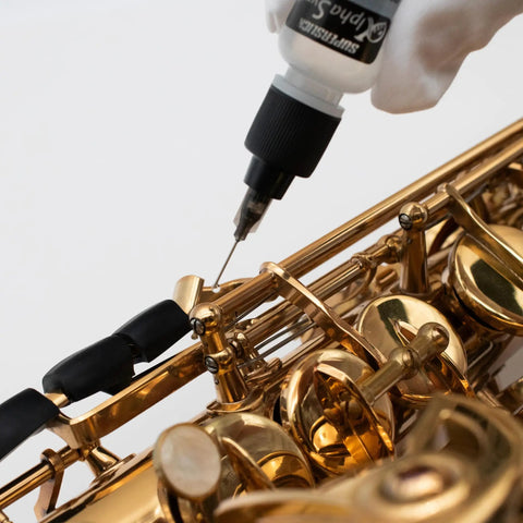 Precision Synthetic Lubricant For Brass And Woodwind Keys And Linkages With Needle Point Applicator For Smooth Quiet Action On Trumpet Trombone Saxophone Clarinet Flute French Horn And More Easy Apply Low Residue applied to saxophone keys