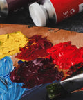 Raw Sienna Oil Paint Pro Grade Studio Tube 170ml with High Pigment Thick Creamy Texture on artist palette with mixed colors